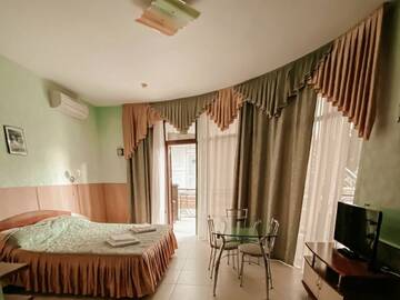 Фото номера Апартаменты-студия Гостиница Holiday г. Лазаревское 10