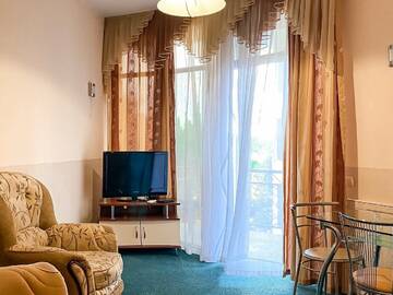 Фото номера Апартаменты с 2 спальнями Гостиница Holiday г. Лазаревское 13
