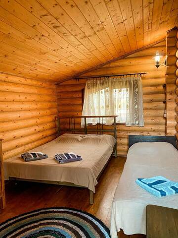 Фото номера Дом с 2 спальнями Гостиница Holiday г. Лазаревское 6