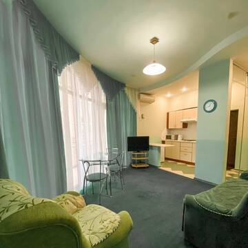 Фото номера Апартаменты с 1 спальней Гостиница Holiday г. Лазаревское 2