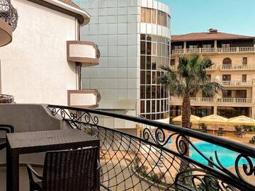 Фото номера Апартаменты с 1 спальней Гостиница Holiday г. Лазаревское 12