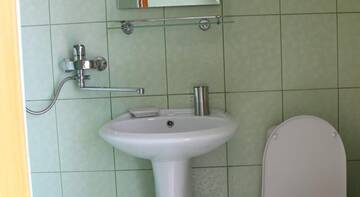 Фото номера Стандартный двухместный номер с 1 кроватью Гостиница Ольга г. Лазаревское 6