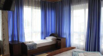 Фото номера Улучшенный трехместный номер Гостиница Guest house Kristina г. Лазаревское 21
